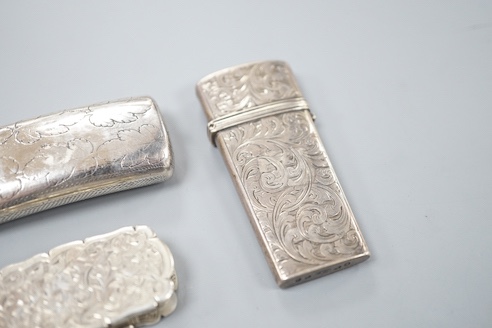 A George III silver oval patch box, John Taylor, Birmingham, 1800, 36mm, a Georgian silver concave combination snuff box/vinaigrette, Samuel Pemberton, Birmingham, 1809?, a Victorian silver pill box and a similar silver